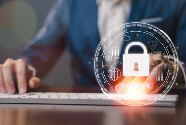 Incidence response 3 » admin by request Business professional using a keyboard with a digital lock hologram symbolizing data security and online protection.